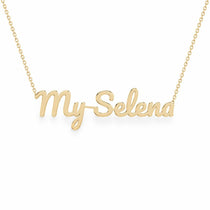 My Selena name necklace in solid 14K Yellow Gold, handmade in Los Angeles