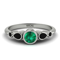 bezel_symmetrical_Emerald_Ring_2.jpg