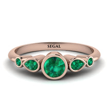 bezel_symmetrical_Emerald_Ring_2.jpg