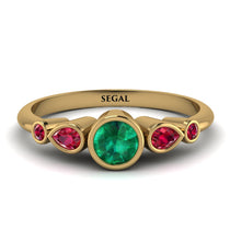 bezel_symmetrical_Emerald_Ring_2.jpg