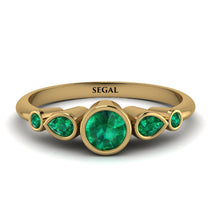 bezel_symmetrical_Emerald_Ring_2.jpg