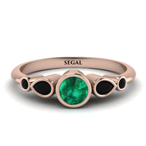 bezel_symmetrical_Emerald_Ring_2.jpg