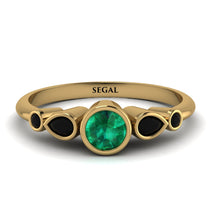 bezel_symmetrical_Emerald_Ring_2.jpg