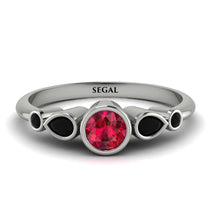 bezel_symmetrical_Ruby_Ring_2.jpg