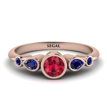 bezel_symmetrical_Ruby_Ring_2.jpg