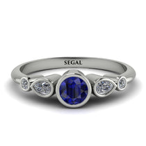 bezel_symmetrical_sapphire_ring_2.jpg