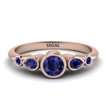 bezel_symmetrical_Sapphire_Ring_2.jpg