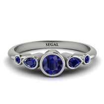 bezel_symmetrical_Sapphire_Ring_2.jpg