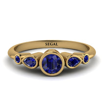 bezel_symmetrical_Sapphire_Ring_2.jpg