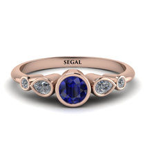 bezel_symmetrical_sapphire_ring_2.jpg
