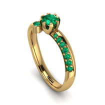 delicate_emerald_engagement_ring1.jpg