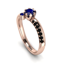 delicate_sapphire_engagement_ring1.jpg