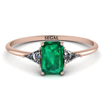 emerald_cut_diamond_with_triangles_ring_2.jpg