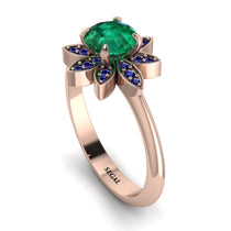 round_emerald_flower_ring1.jpg