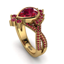 unique_pear_cut_ruby_ring1.jpg